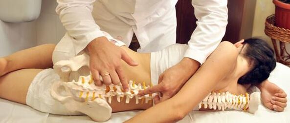 Doctor shows osteochondrosis of the spine