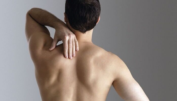 Back pain between shoulder blades in male